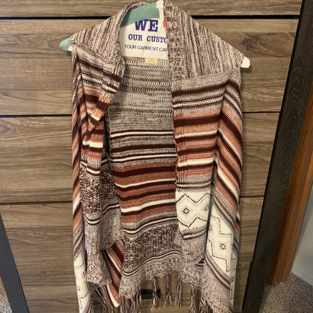 Long sleeveless vest
